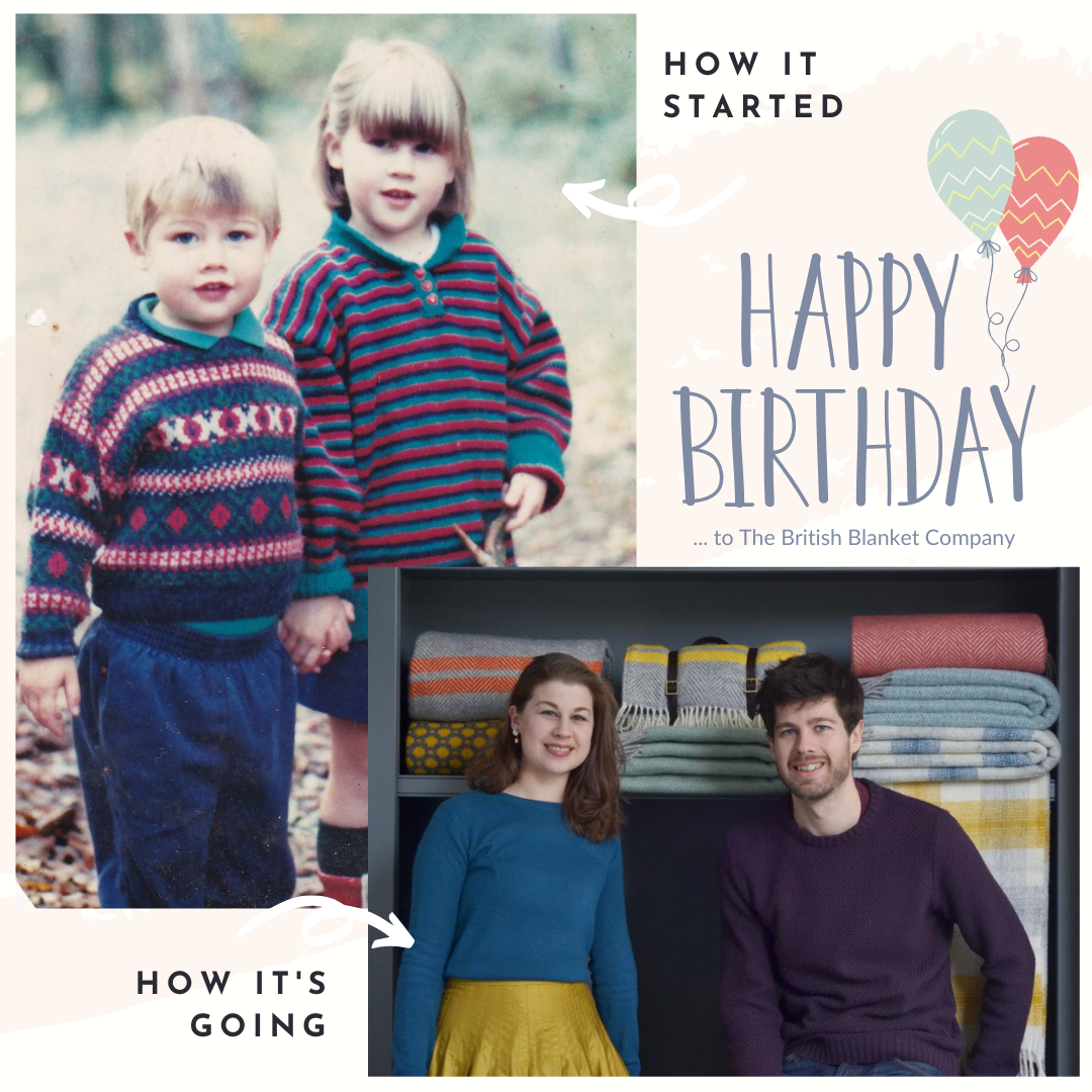 A man in a purple sweater and a woman in a blue shirt smiling, standing in front of a shelf of blankets.