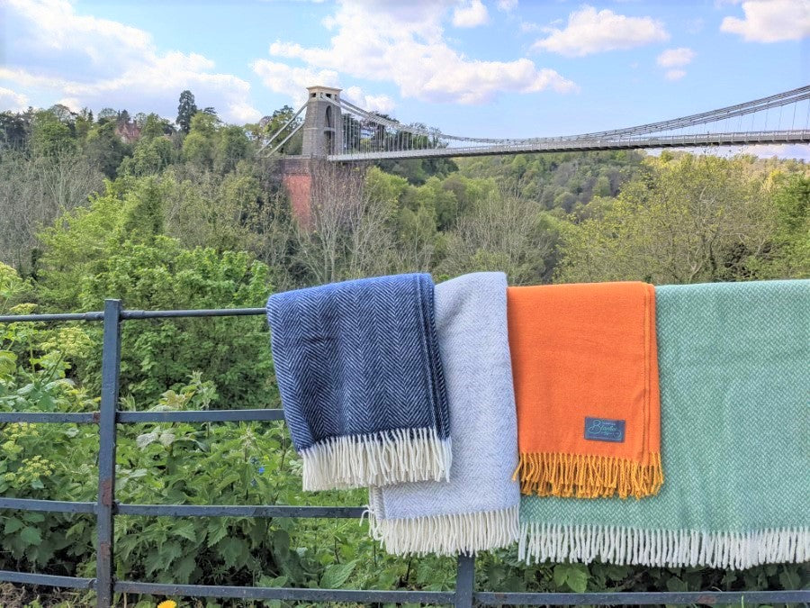 wool blankets made in the uk. Blue blanket. Green blanket. orange blanket. super soft blankets.