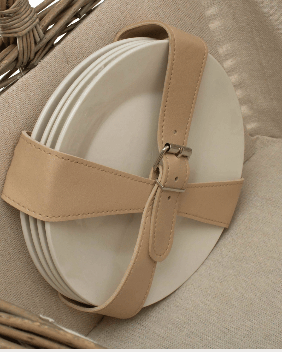 Ceramic plates feature in our woven picnic hamper in antique wash, made for 4 people