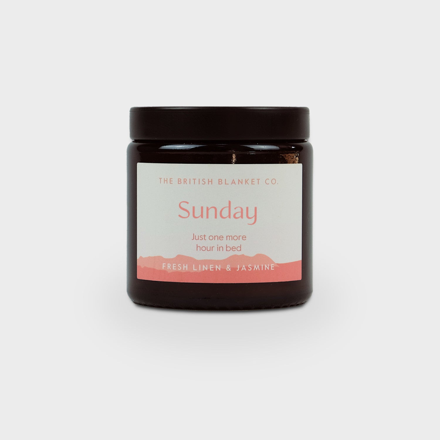 Amber Jar Candle by The British Blanket Co., featuring a hand-poured soy wax candle in a jar, designed to enhance cozy moments with sophisticated fragrances.