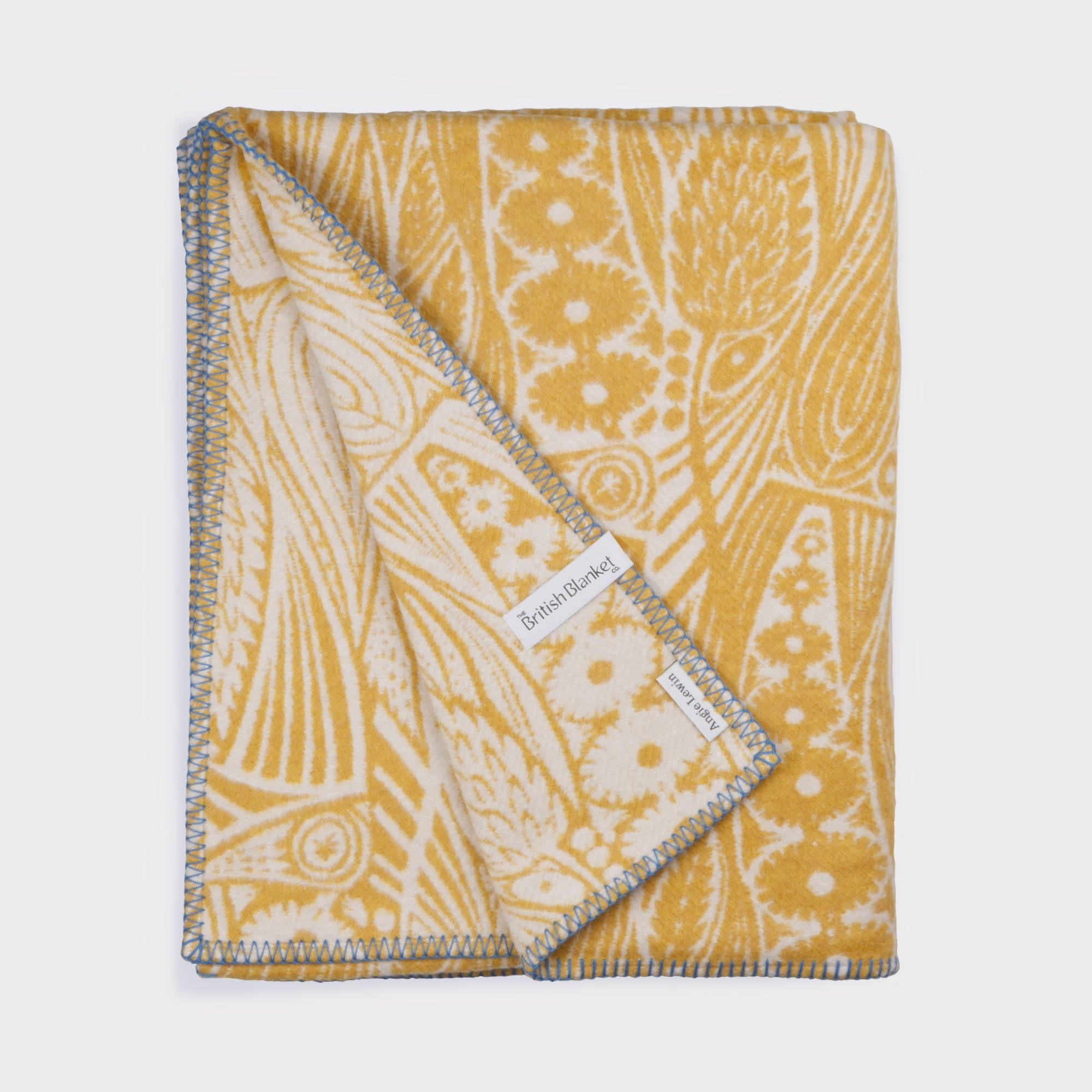Meadow Grass in Yellow Could Cotton Blanket by the British Blanket Company and Angie Lewin.