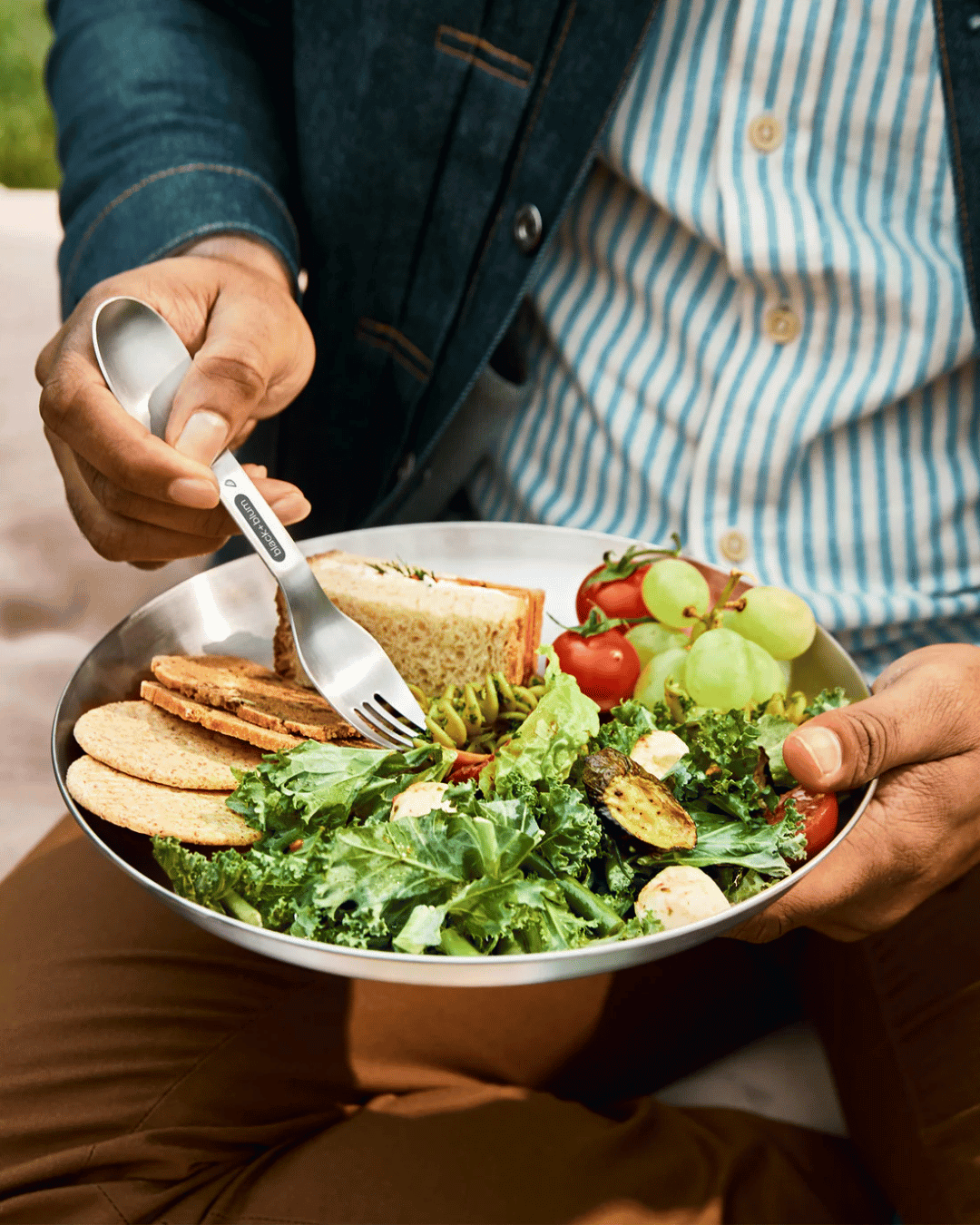 A hearty meal in the park, using the Black + Blum Stainless Steel plate and spork