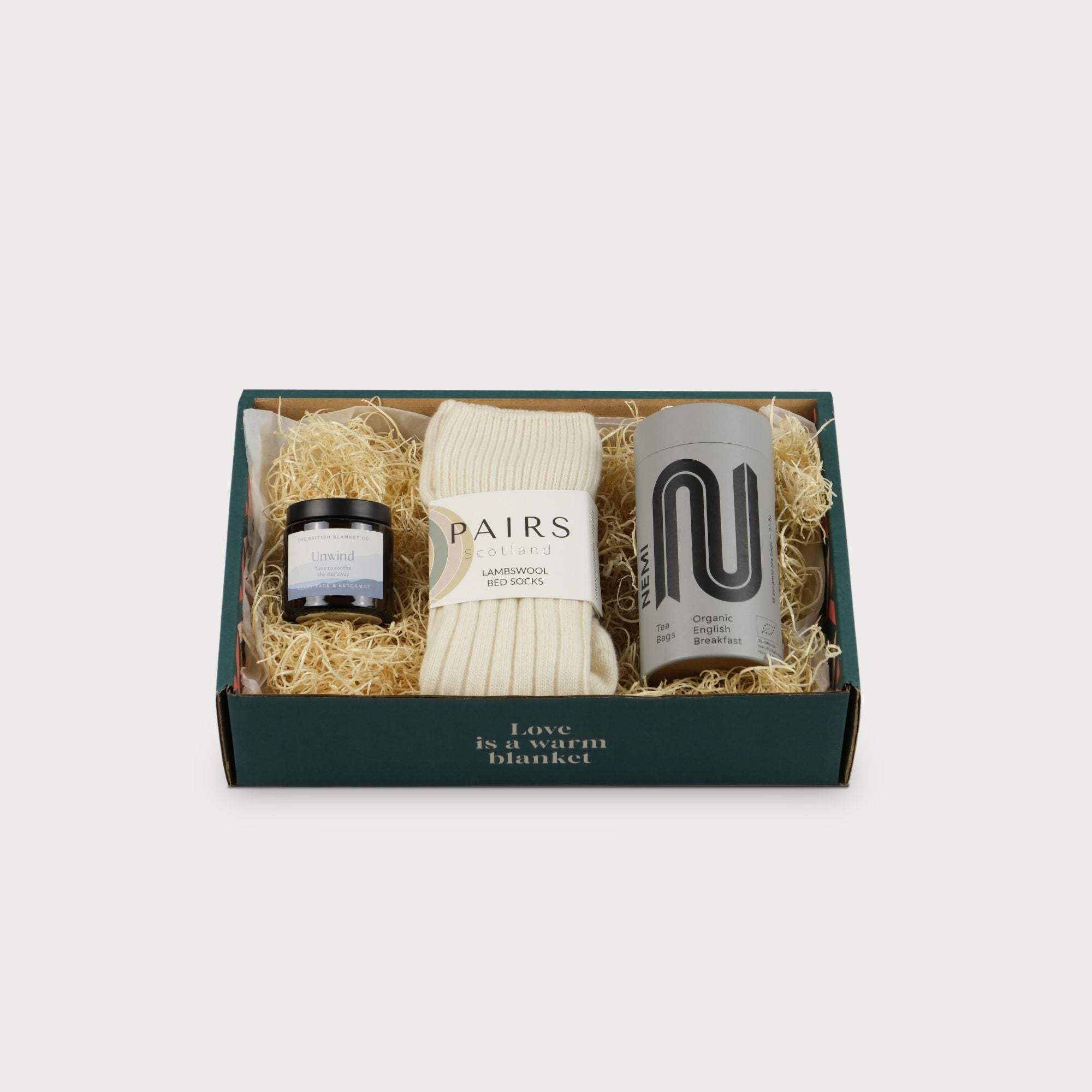 Cosy Gift Box: Me Time, featuring a white can with black text, highlighted in a close-up of its packaging and labeling.