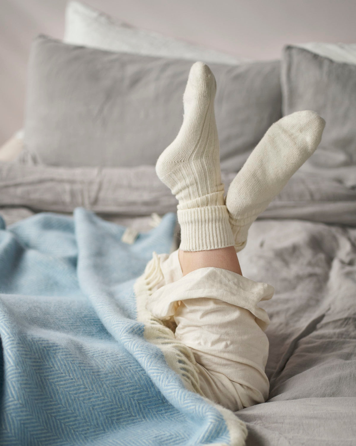 Lambswool Bed Socks designed for comfort, featuring a thick, cozy texture ideal for lounging. Made with lambswool blend for warmth; one size fits all.