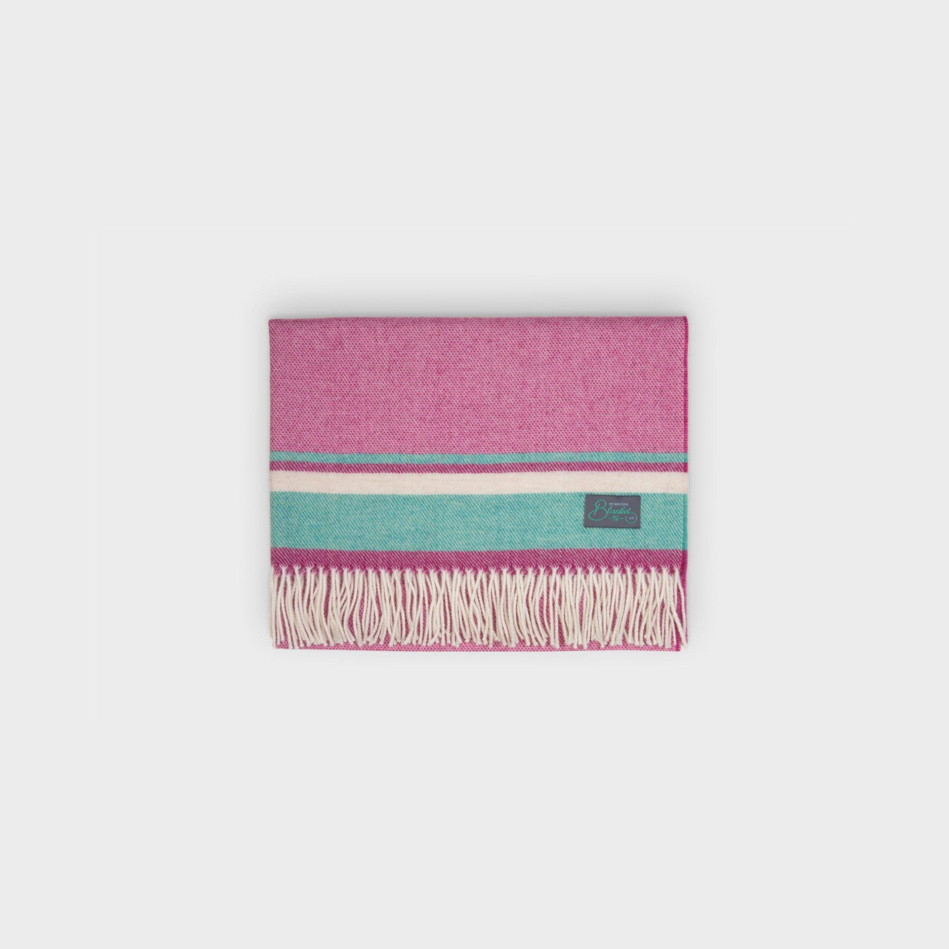 Merino Lambswool Baby Blanket Gift Box: Wilykit, features a fringed pink blanket with teal and cream bands, and a knitted cotton teddy bear.