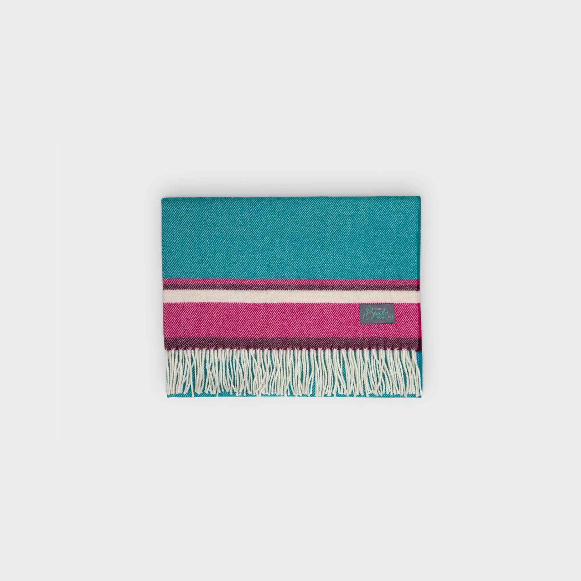Merino Lambswool Baby Blanket Gift Box: Marina features a teal blanket with pink and ivory stripes, cream tassels, and a knitted cotton teddy bear.