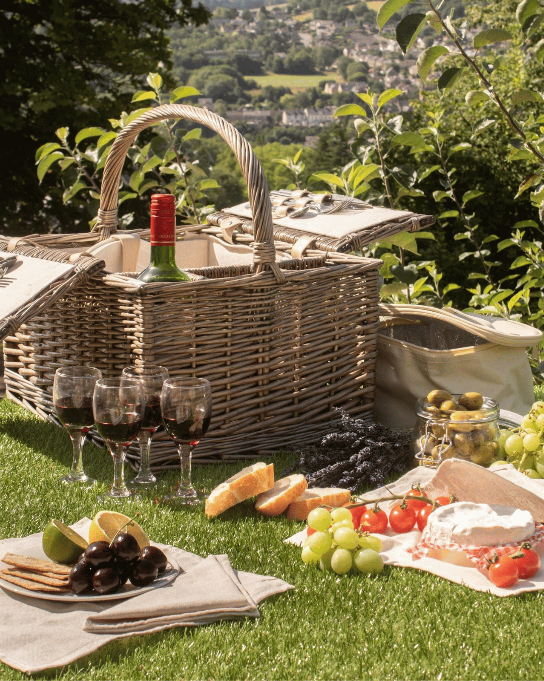 Woven willow picnic hamper with 4 sets of plates, glasses and cutlery, made for a luxurious life on the go