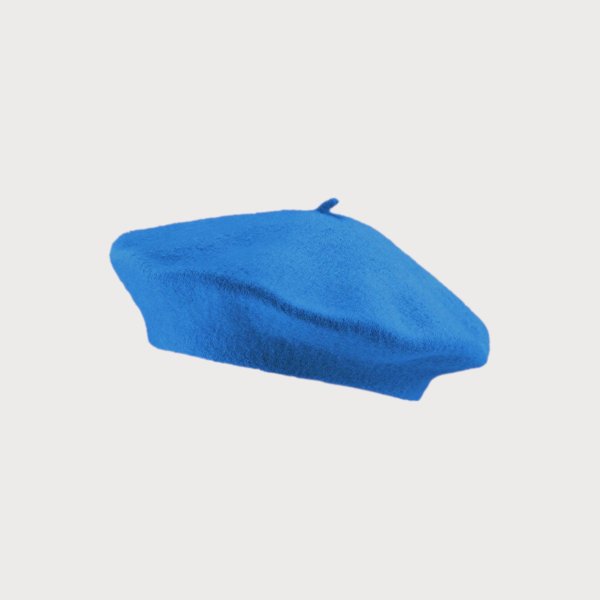 Wool Beret Hat: Petrol Blue, featuring a thick wool felt for warmth and elegance, displayed against a plain background. Fits up to 58cm circumference.