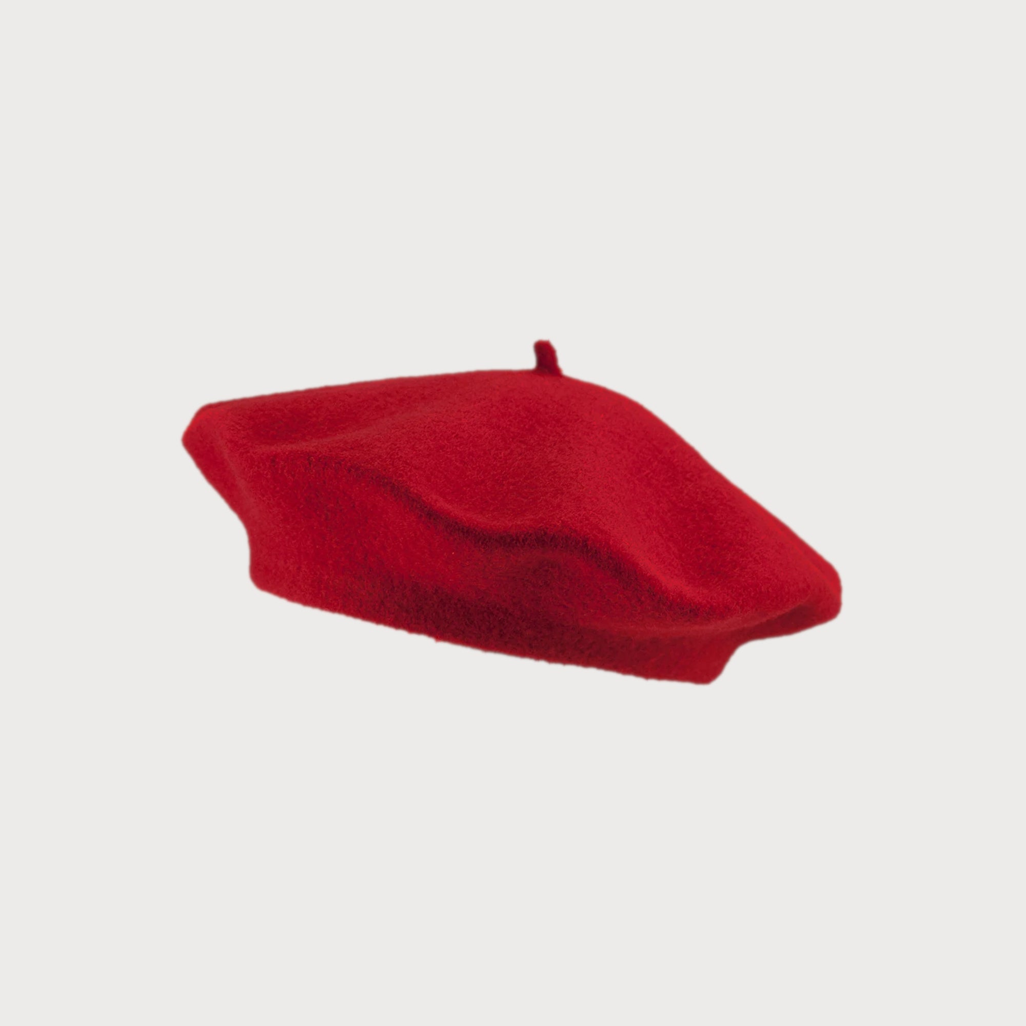 Wool Beret Hat: Red, classic round design, thicker wool for durability, fits most adults. Ideal for warmth without bulk, complements Herringbone and Oversized Blanket Scarves.