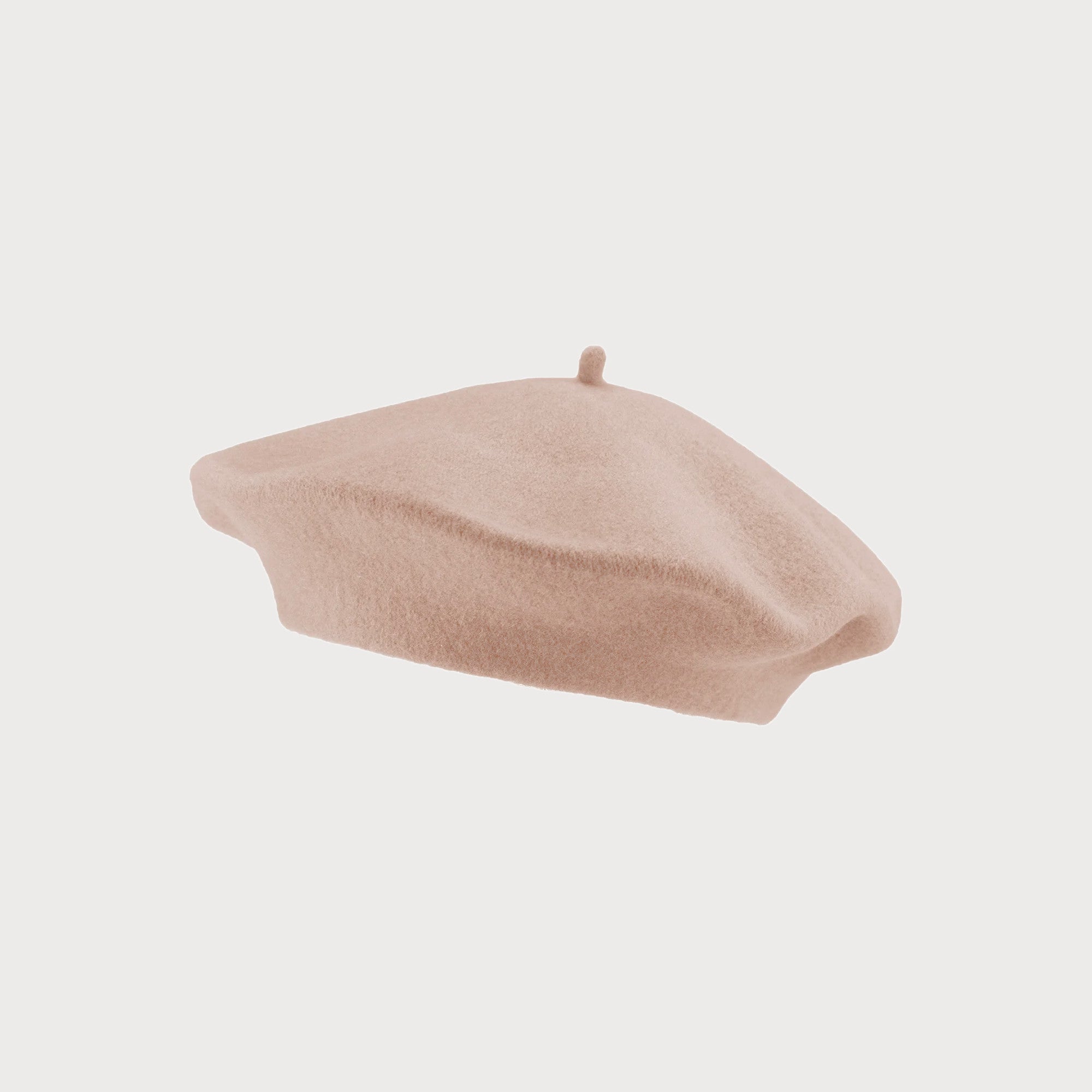 Wool Beret Hat: Baby Pink, a soft, premium wool beret, lightweight yet warm, offering a chic French style with a one-size fit for most adults.