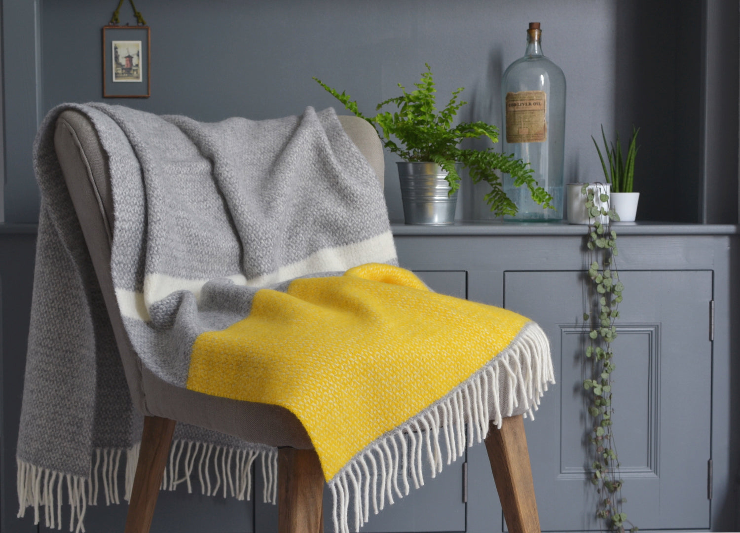 grey and yellow small wool blanket on a chair