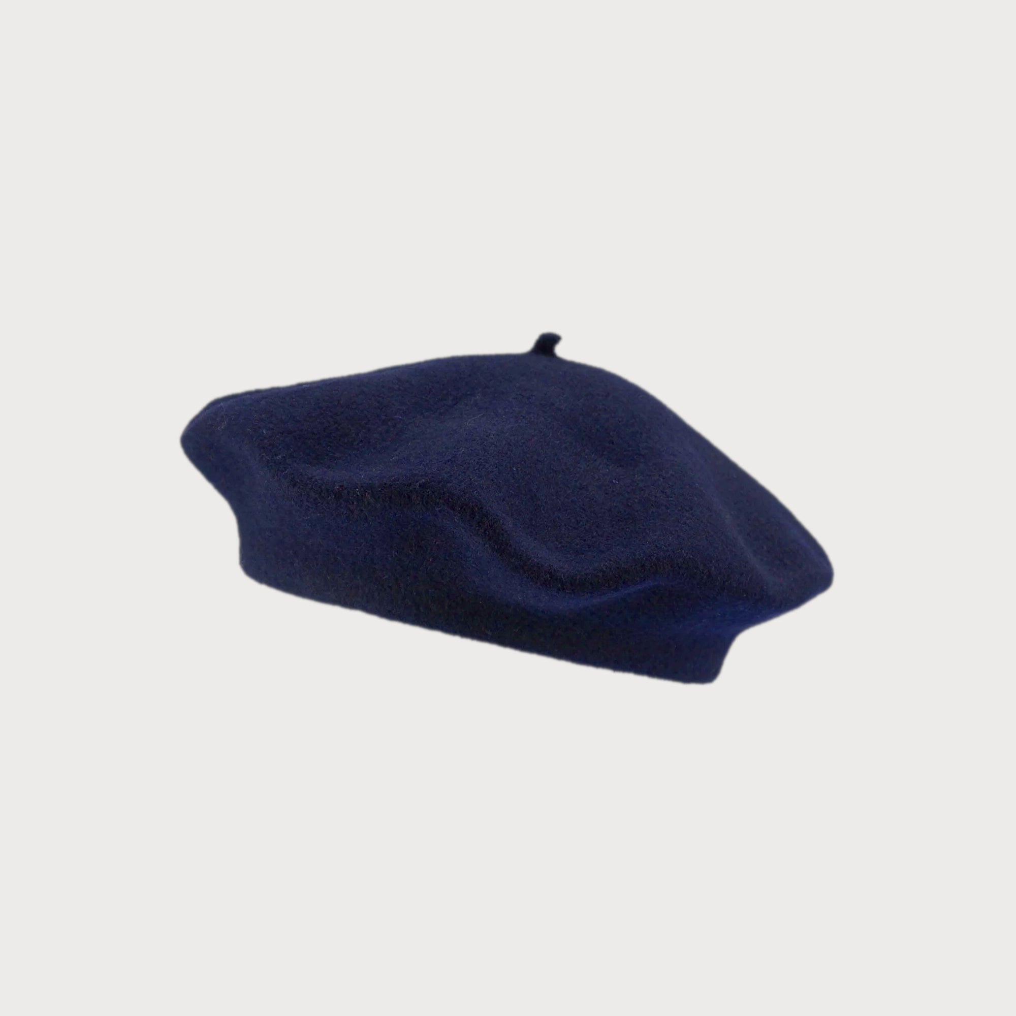Wool Beret Hat: Navy Blue, crafted in premium thicker felt, offering structure and breathable warmth for all seasons; one-size fits most with max circumference of 58cm.