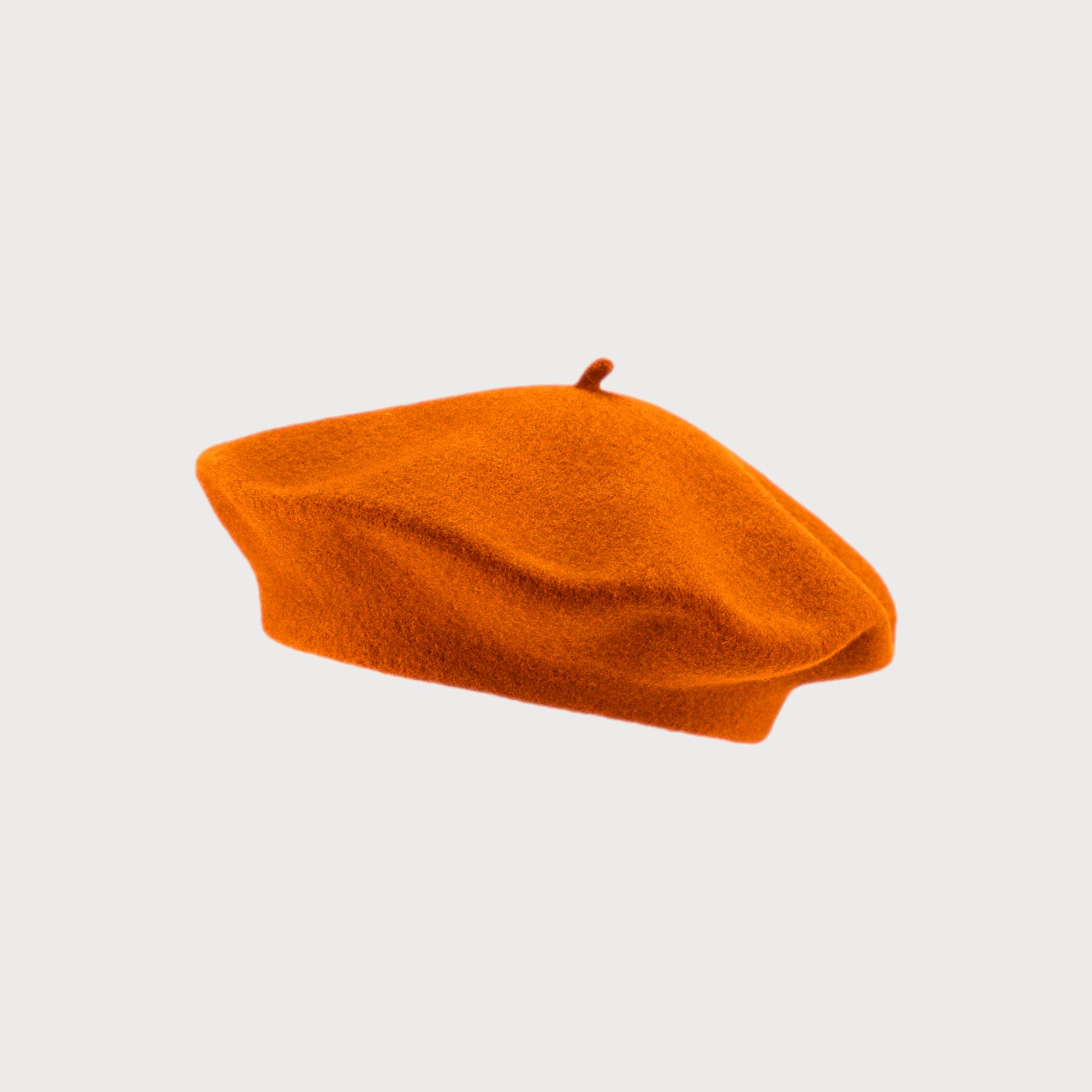 Wool Beret Hat: Orange, crafted from premium thick felt, showcases a soft, flat-crowned design, ideal for warmth and style. One-size fits most adults.