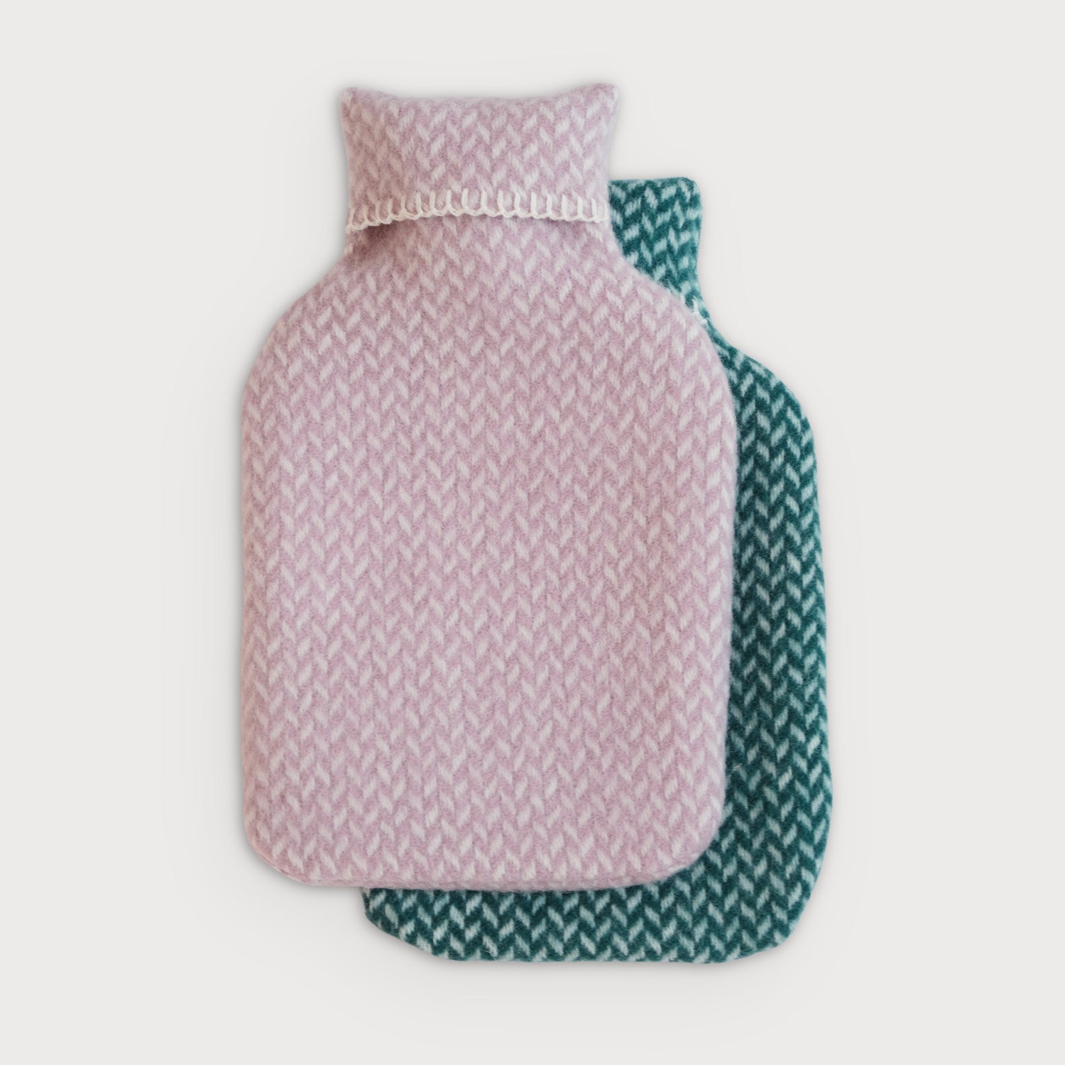 Cosy Gift Set: Bedtime Box featuring a patterned hot water bottle with a wool cover, part of a warm and comforting sleep collection.