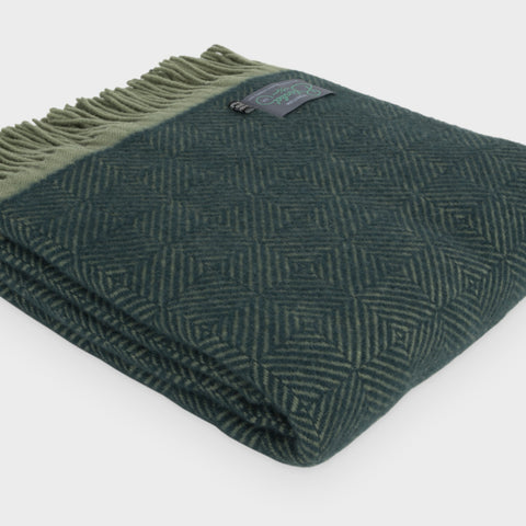 Folded XL green wildweave wool throw by The British Blanket Company