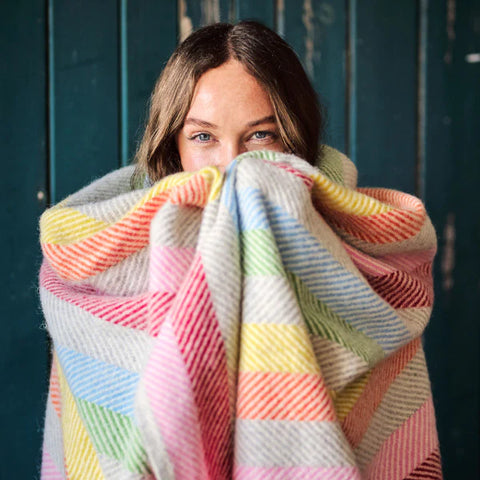Bright and bold wool blanket to cosy up in 