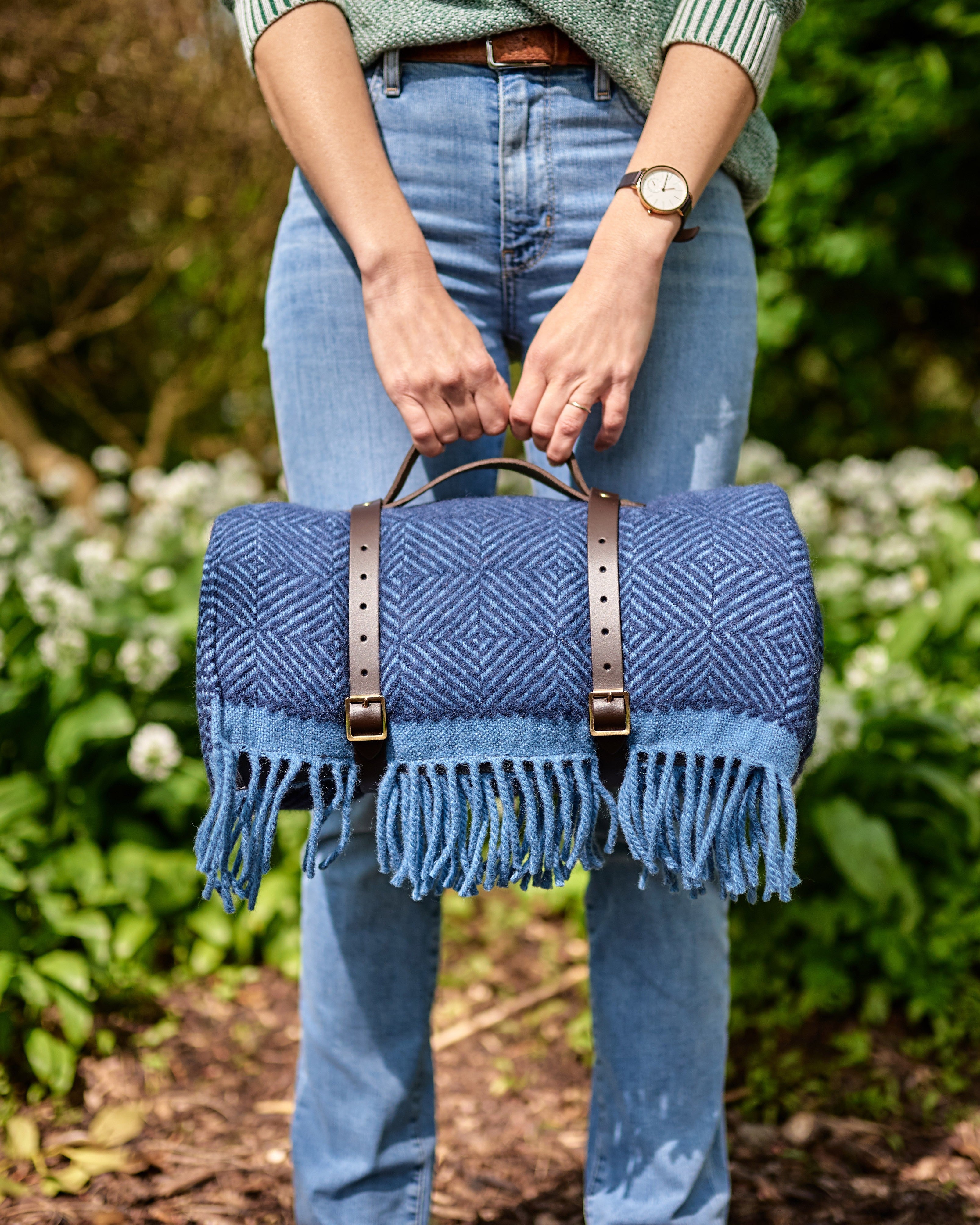 Waterproof Picnic Blanket: Midnight and Dusk, featuring a handmade wool design, waterproof backing, and leather carry straps, ideal for picnics and gifting.