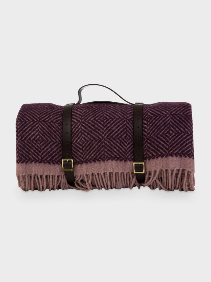 Purple wool picnic blanket with leather straps from The British Blanket Company
