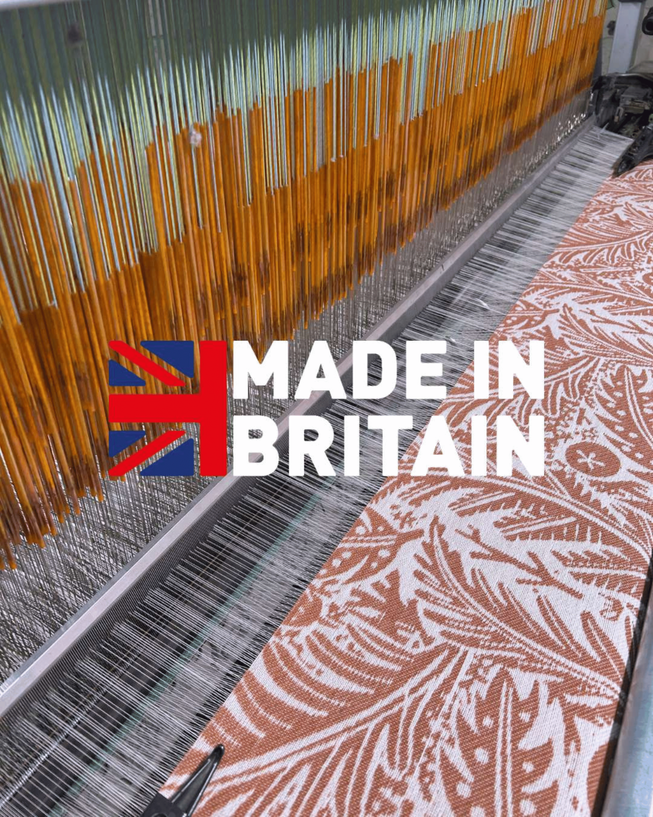 Made in Britain logo on top of a Forest Floor in Rust blanket by Angie Lewin.