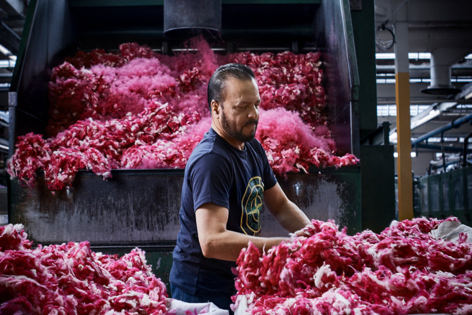 raw wool in a mill. Wool material. Wool products. Best wool blankets online. Uk wool blankets. British blankets made from wool. 