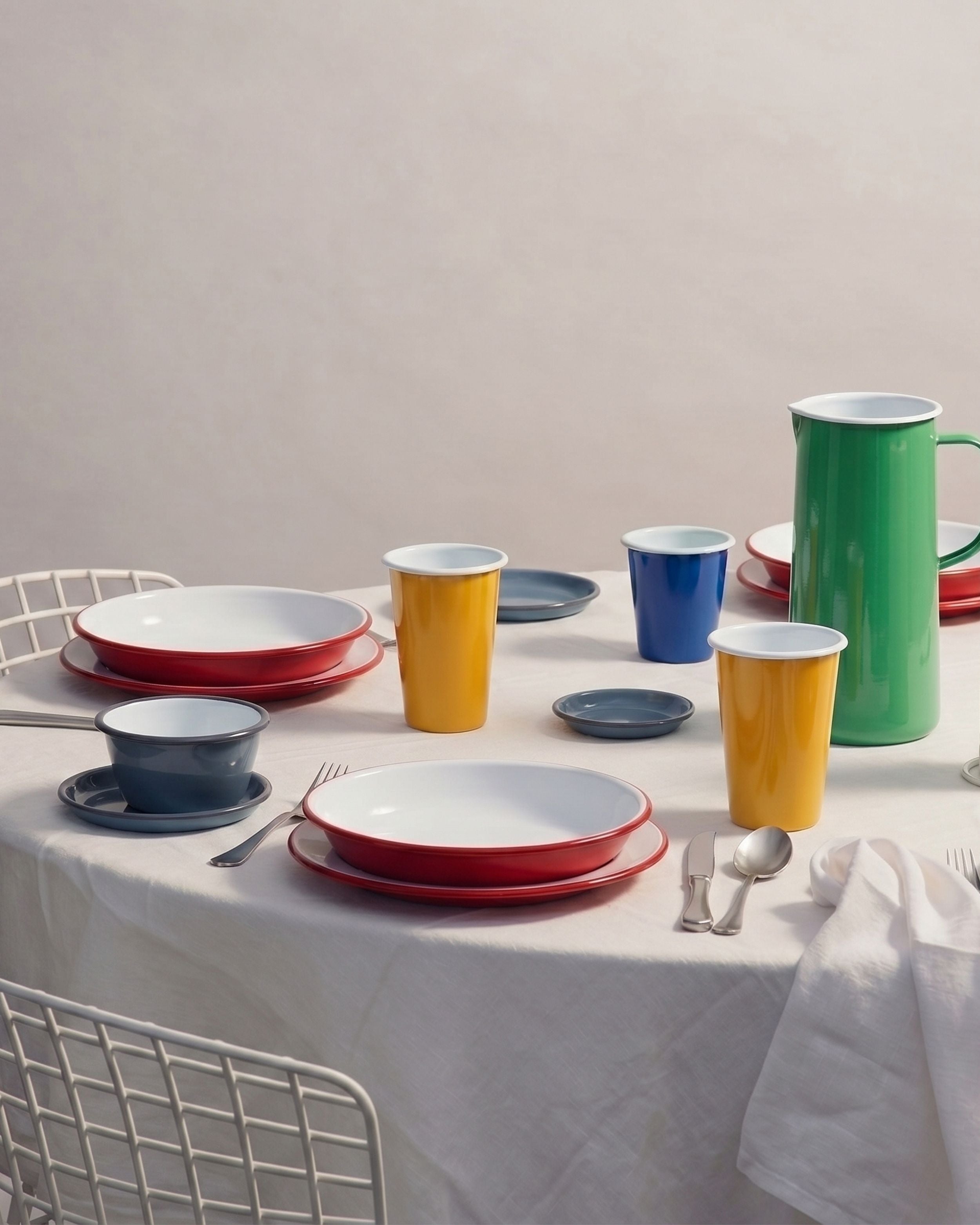 The Falcon enamel collection set up for dinner