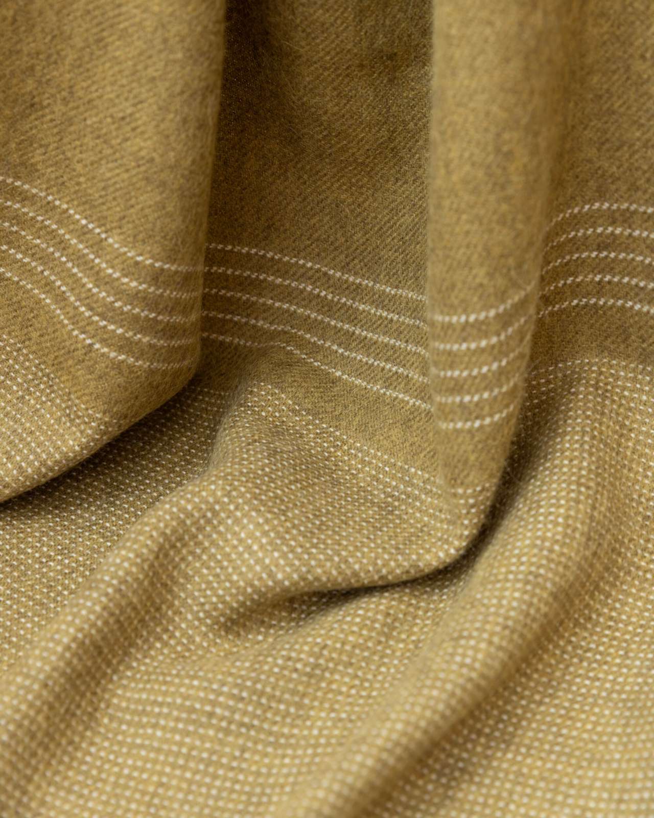 Alpaca Blanket Gift Box: Golden Moss features a mustard-yellow alpaca blanket with speckled weave and white stripe, perfect for thoughtful gifting.