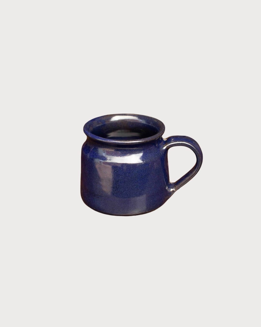 Deep-blue glazed ceramic mug from the Cosy Gift Set: Tea for Two, highlighting its handcrafted design, ideal for sharing a premium tea experience.