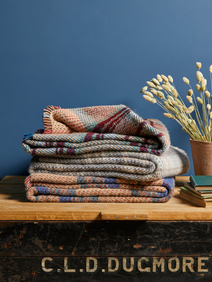stack of Random recycled wool throw blanket - The British Blanket Company