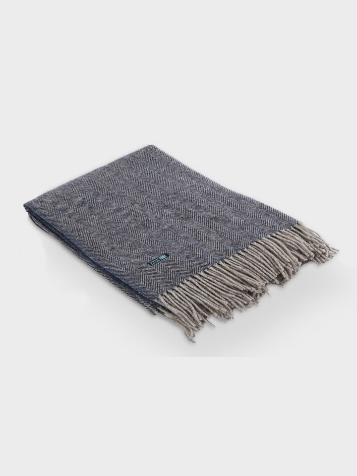 Folded dark navy blue Cashmere and Merino Recycled Wool Blanket by Turtle Doves for The British Blanket Company