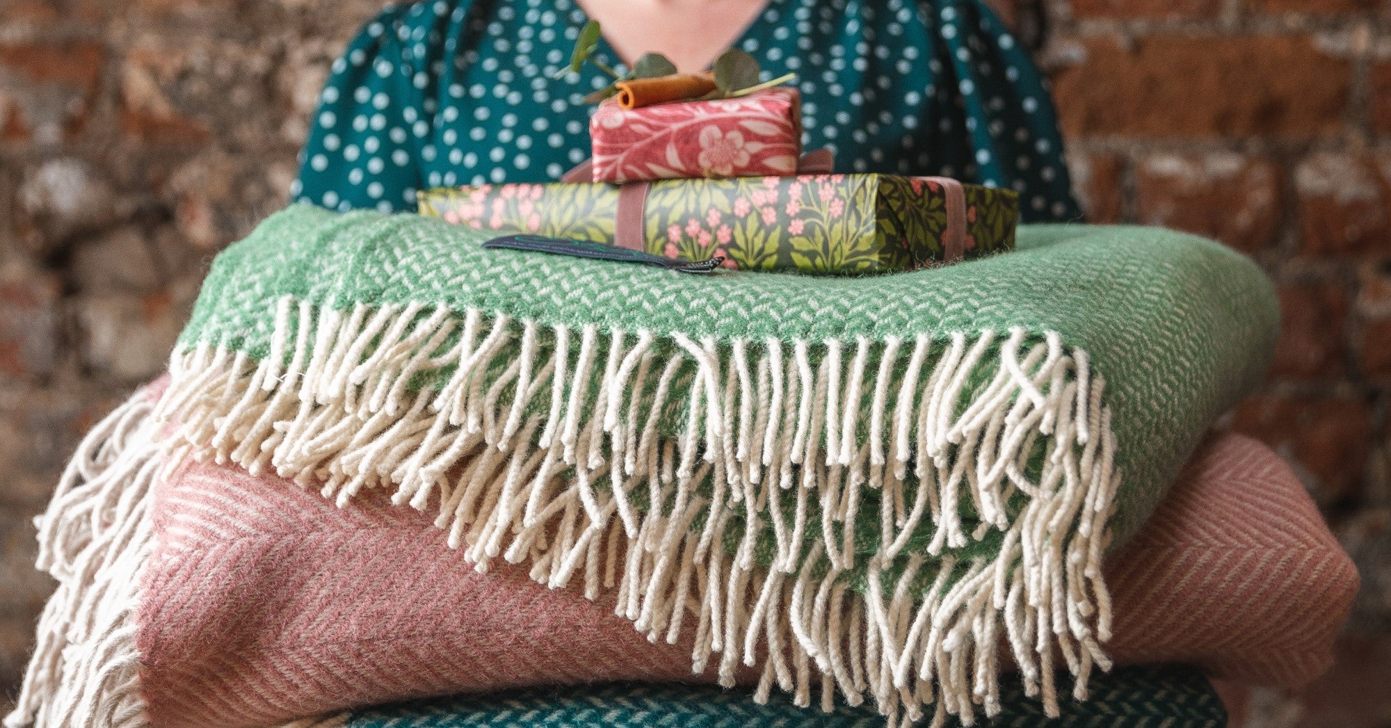 Stack of wool blanket throws from The British Blanket Company