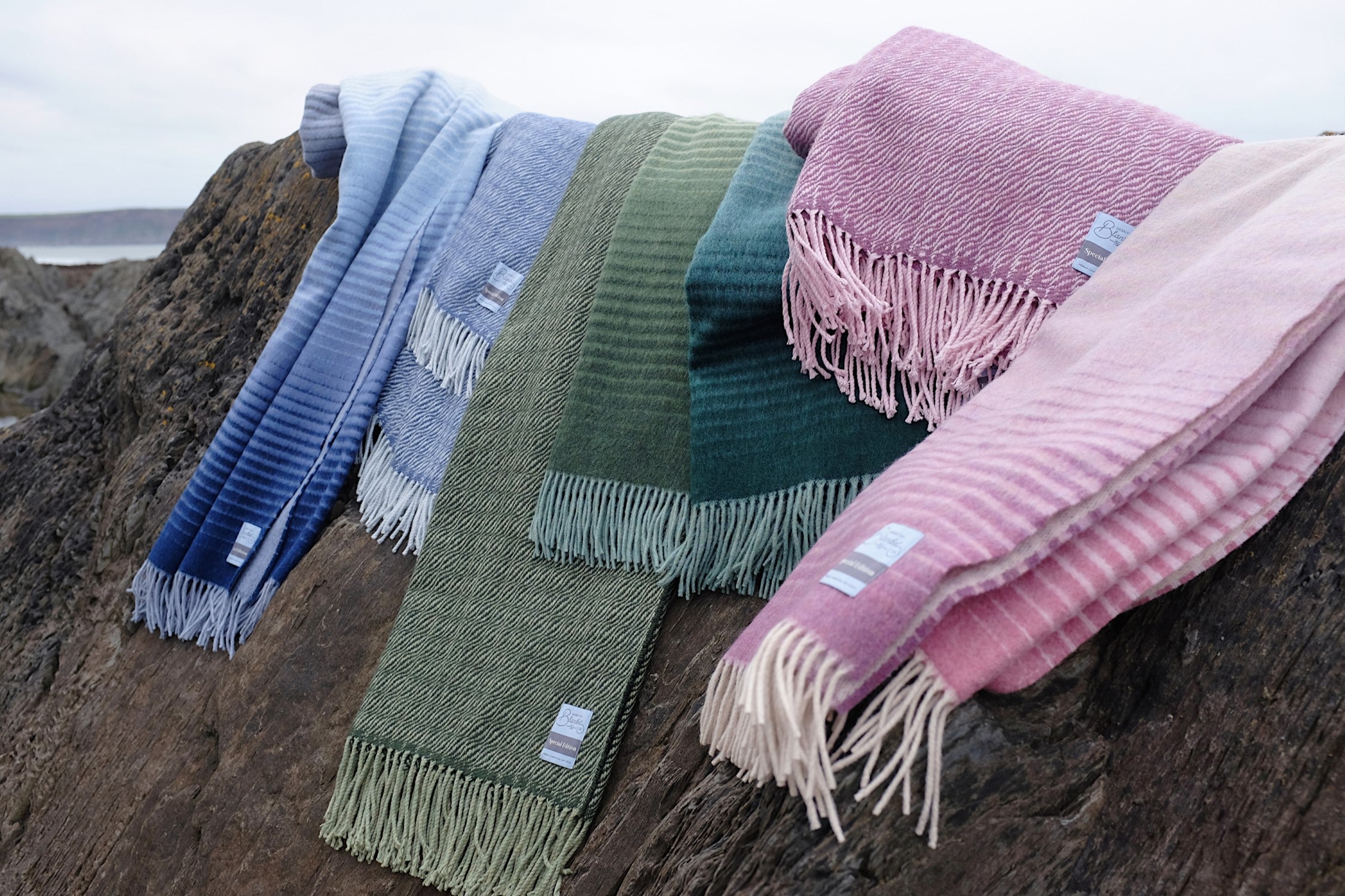 wool blankets. super soft blankets. pink blanket. green blanket. blue blanket. UK wool blankets. British blanket company. 100% wool. No synthetic fibers. Wool blankets made in the UK. Free UK shipping. super soft blankets. Large blankets