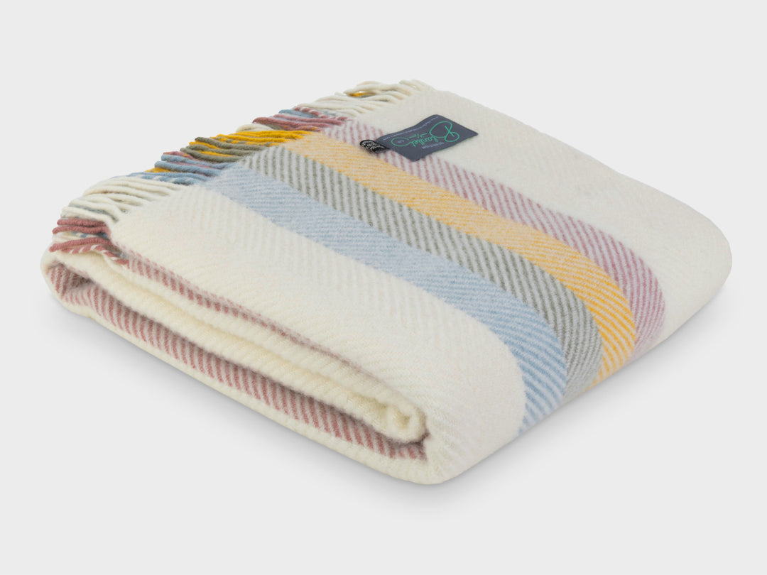 Folded Pastel Rainbow Stripe Herringbone Throw by The British Blanket Company