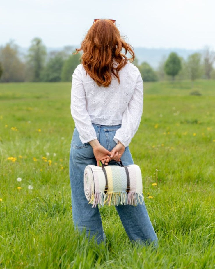 Waterproof Picnic Blanket: Pastel features a handmade design with a waterproof backing and leather straps, ideal for outdoor use.