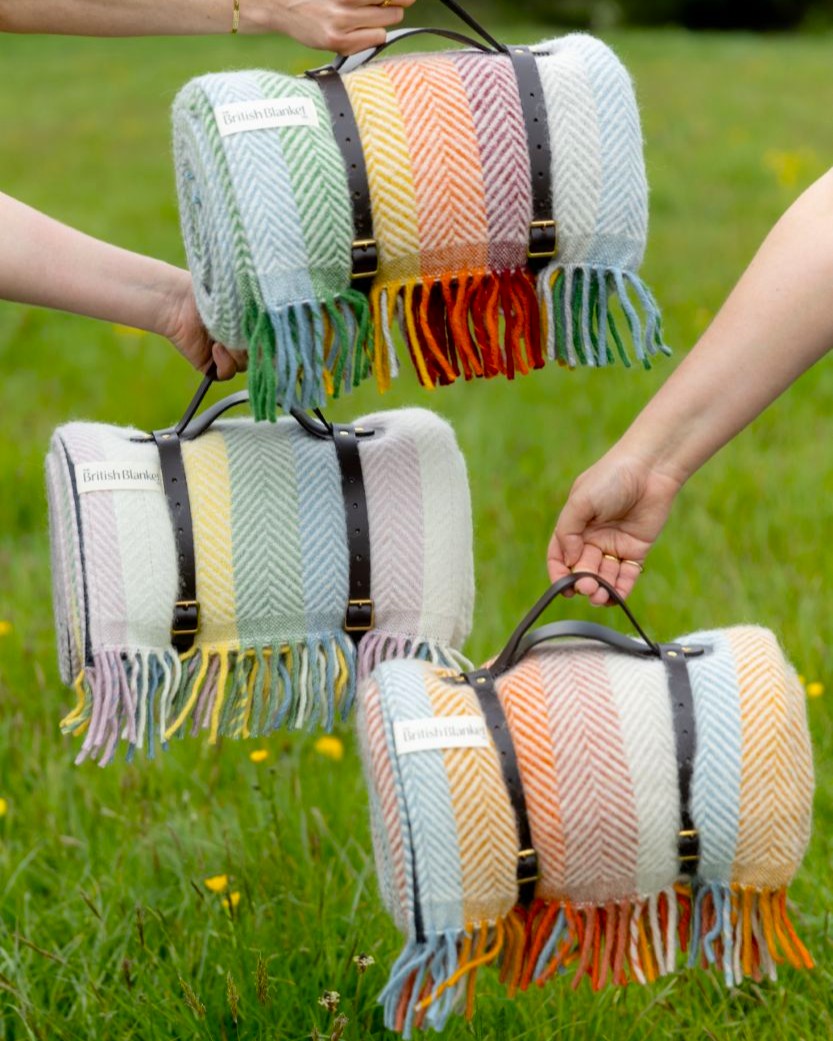 Waterproof Picnic Blanket: Pastel, featuring subtle rainbow stripes, waterproof backing, and leather carry straps, perfect for outdoor use and gifting.