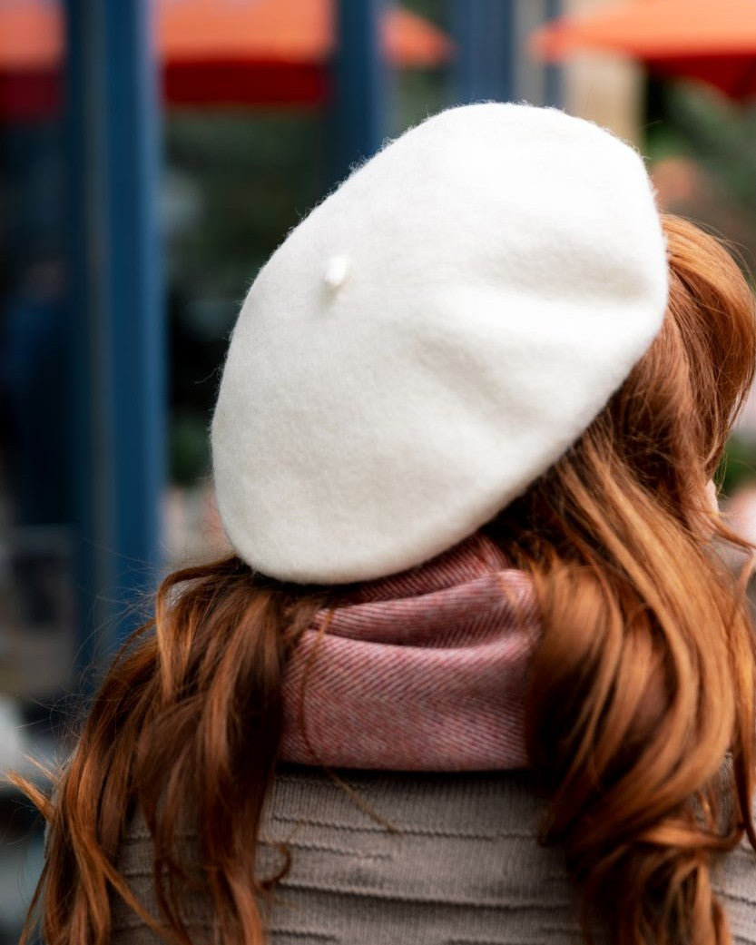 Cream Wool Beret Hat, Woolmark-certified, expertly knitted and hand-felted for shape, offering breathable warmth with a thicker-than-usual wool felt material. Maximum circumference 58cm.