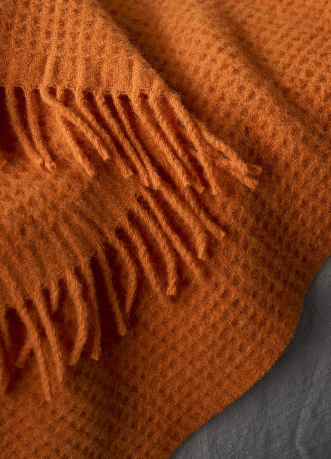 Detail image of orange waffle blanket
