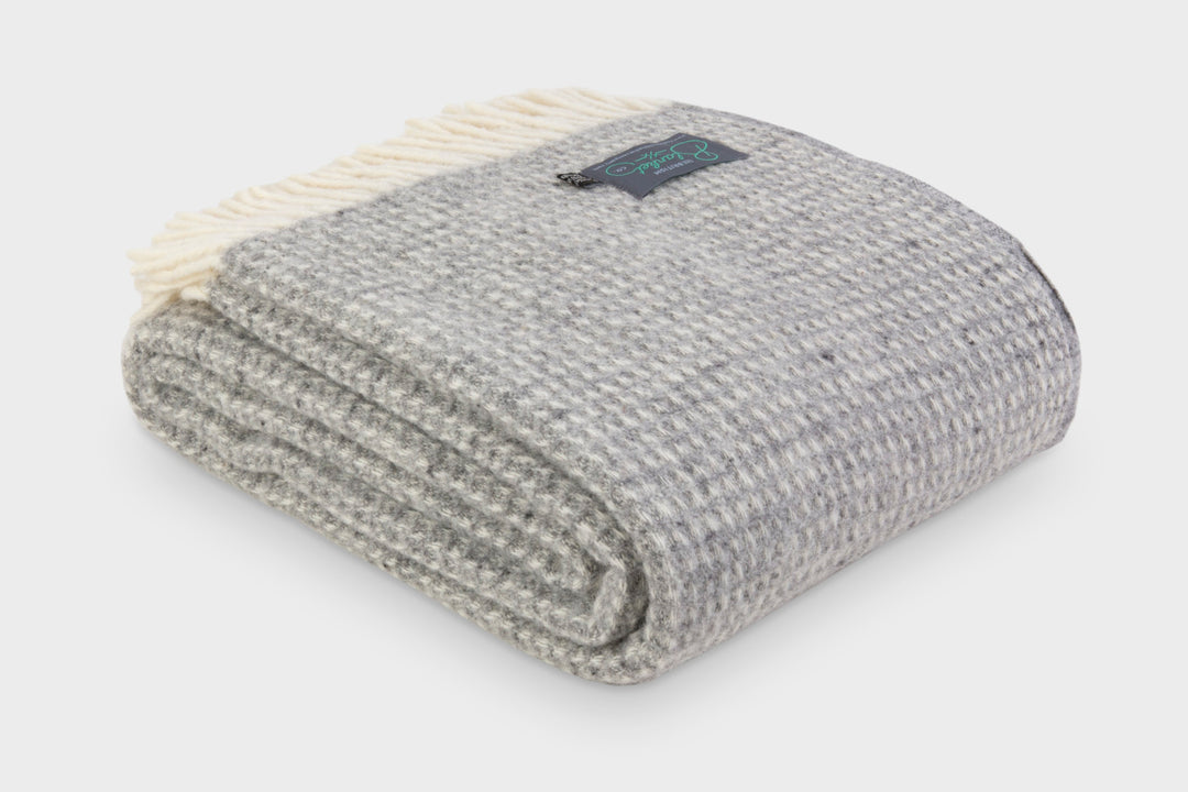 Folded XL grey waffle wool throw by The British Blanket Company