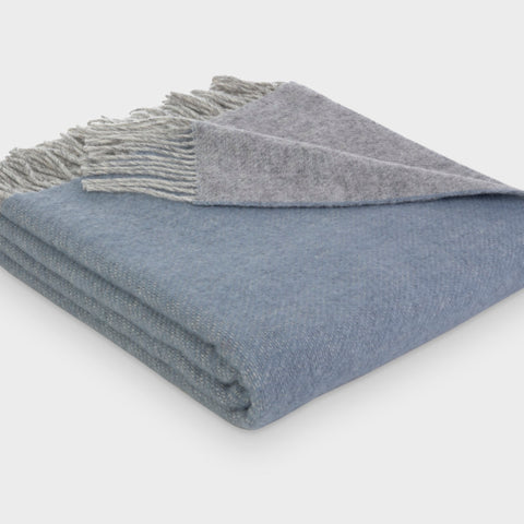 Folded blue and grey reversible wool throw blanket by The British Blanket Company