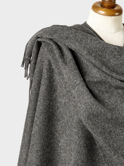 Closeup of grey wearable blanket wrap on a mannequin.