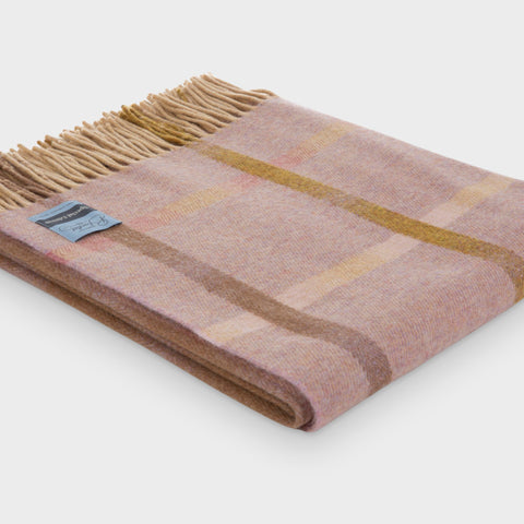 Folded pink Garden Flowers wool throw by The British Blanket Company