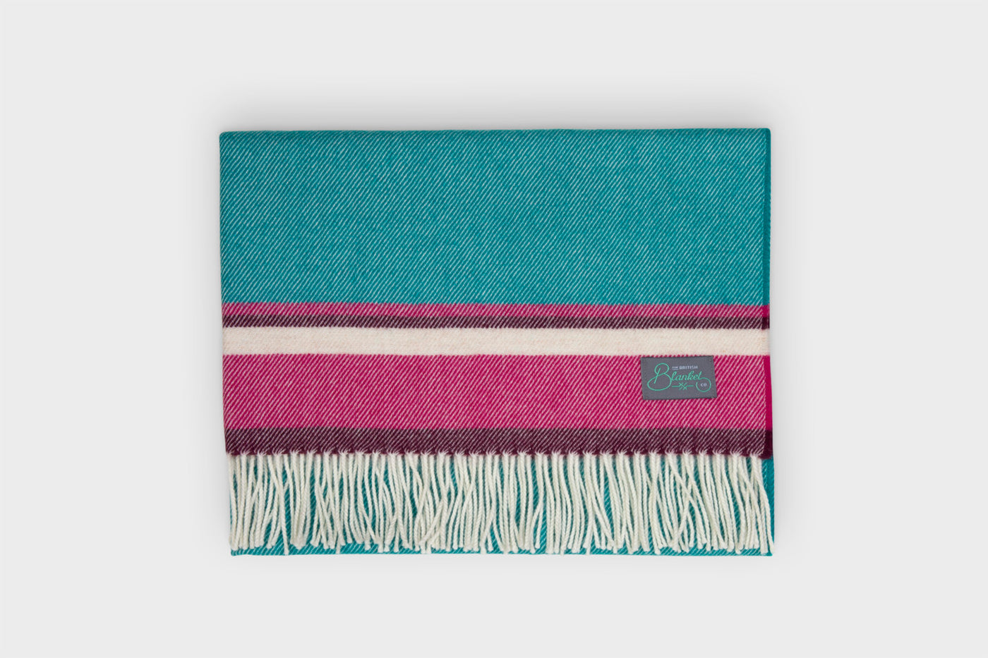 Folded multicoloured lambswool baby blanket by The British Blanket Company
