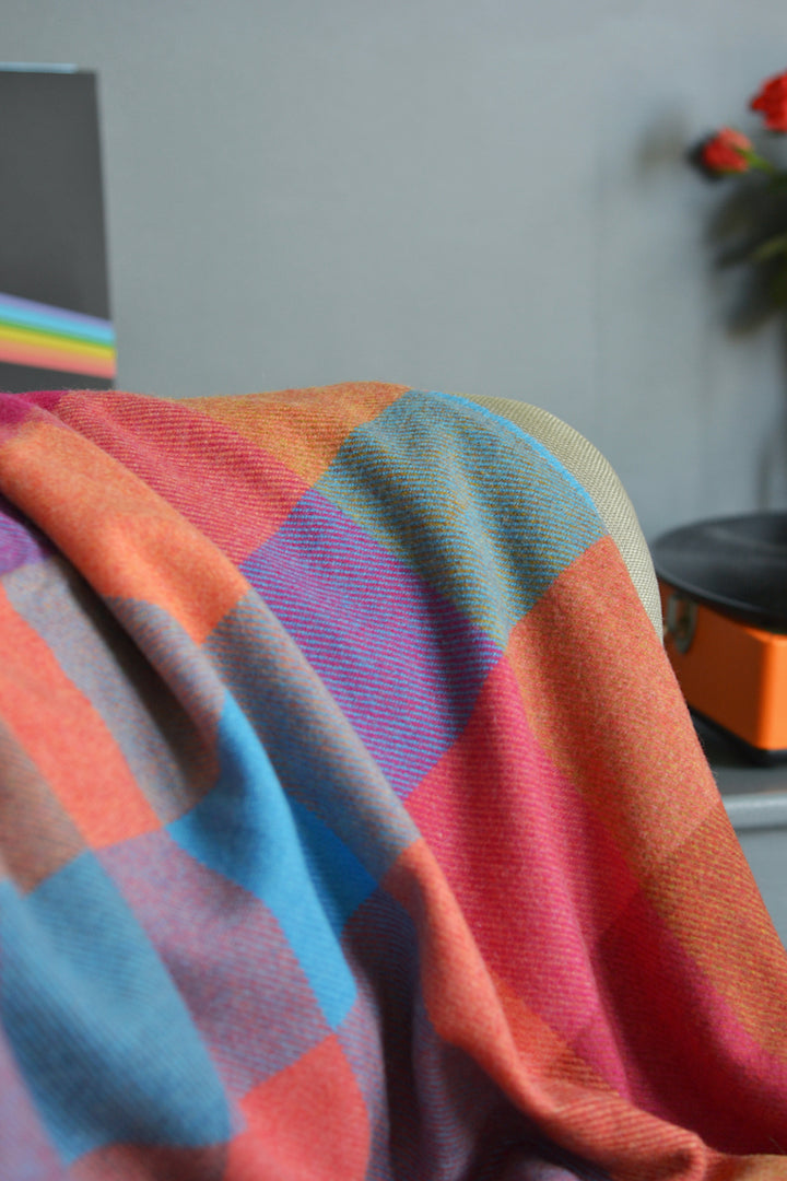 A large multicoloured check wool blanket