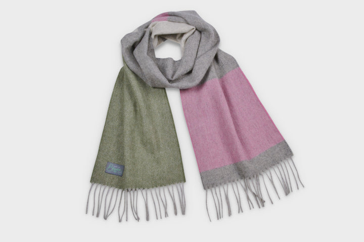 Green, pink, and grey coloured lambswool scarf by The British Blanket Company