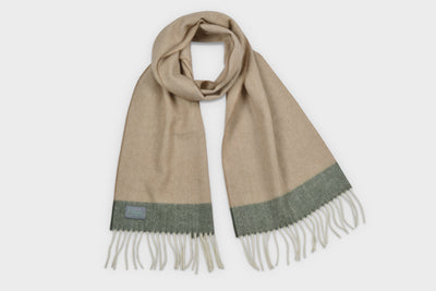 Beige and green lambswool scarf by The British Blanket Company.