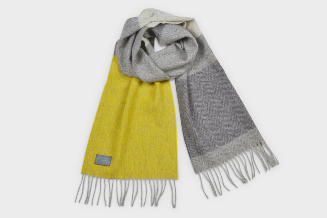 Yellow and grey lambswool scarf by The British Blanket Company.