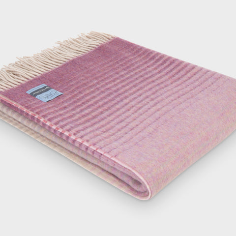 Folded pink ombre merino wool throw by The British Blanket Company
