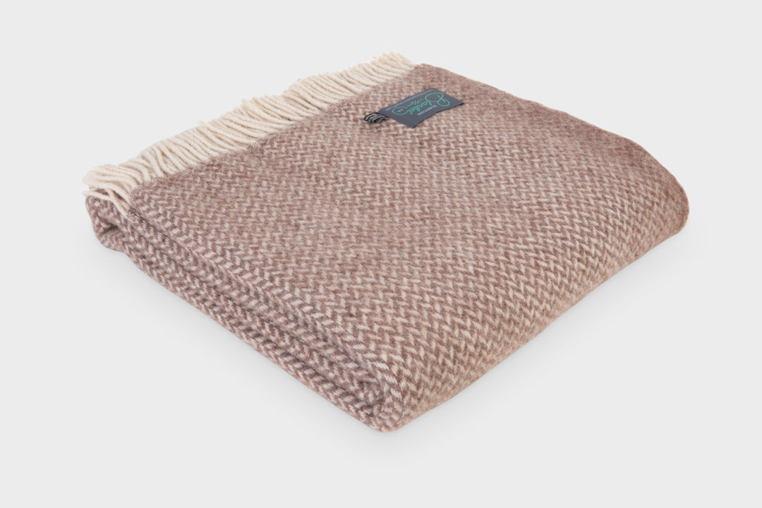 Folded large brown herringbone wool throw by The British Blanket Company