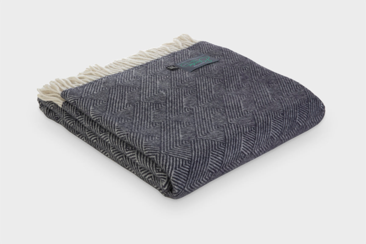 folded steel grey blue mountain pattern throw blanket by The British Blanket Company online shop