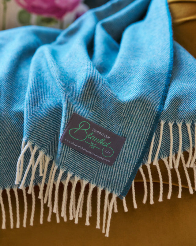 close up of cornish blue herringbone merino wool throw blanket by The British Blanket Company online shop