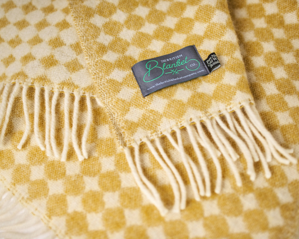 yellow jacquard spot blanket throw from The British Blanket Company